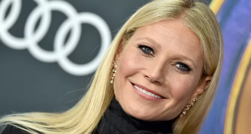 Gwyneth Paltrow smiling at the 'Avengers Endgame' premiere in an all-black wardrobe.