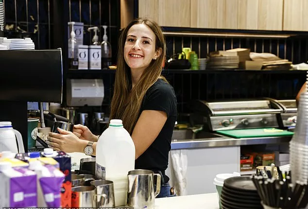 The minimum wage will increase to $23.23 an hour or $882.80 a week. Pictured is a cafe worker in Sydney