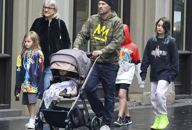 Brian Austin Green was spotted going for a stroll in Sydney on Thursday with their little boy and the three children the actor shares with his ex-wife Megan Fox - Noah Shannon, 10, Bodhi Ransom, nine, Journey River, six, on Thursday
