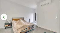 The Melbourne Harcourts listing (pictured) which has been since removed was posted to social media on Thursday showing the bed with a human-shaped lump underneath