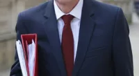 Parents should not keep children off school if they have a cold, the school’s minister Nick Gibb (pictured) has warned