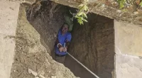 A 76-year-old pensioner (pictured) had to be rescued after he fell through a garden patio and became trapped 6ft 7in down a well