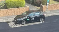 In the way: Residents were left bemused after a solitary black Hyundai remained in place during resurfacing works in Craighouse Gardens, Edinburgh