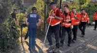 A 15-year-old boy has revealed his shock after discovering a human placenta on his way to school in a Southampton park. Pictured are police at the cordon