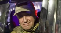 Yevgeny Prigozhin, the owner of the Wagner Group military company, looks out from a military vehicle on a street in Rostov-on-Don, Russia, Saturday, June 24, 2023