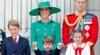 Prince William and Kate Middleton, who weren't in a 'hurry to curb' Prince Louis's enthusiasm at Trooping the Colour, stand with their children on the Buckingham Palace balcony