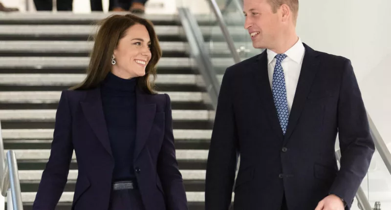 Kate Middleton and Prince William, whose lack of PDA is good, according to a body language expert, walk down a staircase