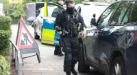 Armed police attend reports of an alleged stabbing at Central Middlesex Hospital in West London