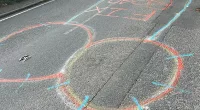 The phantom pothole protest began several weeks ago when local residents discovered the graffiti
