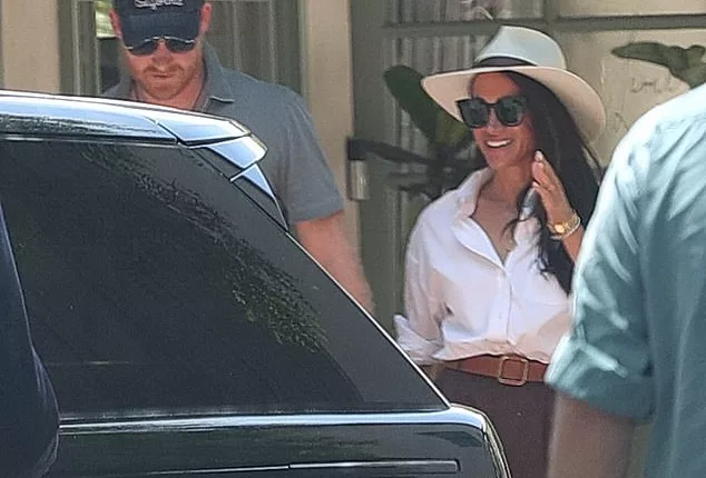 The Duke and Duchess of Sussex were all smiles during their first public outing since their eviction from Frogmore Cottage. The couple are pictured on Friday in Santa Barbara, California