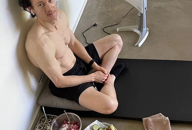A billionaire tech guru whose quest is to 'live forever' has revealed how he hacked his complex daily routine to extend his life as long as possible. Pictured with his breakfast