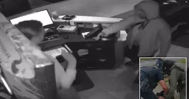 Dramatic moment Uzi-wielding robber holds up hotel staff in Atlanta