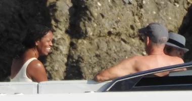 EXCLUSIVE: Michelle Obama hangs out with shirtless Tom Hanks in Italy
