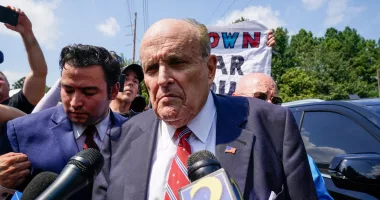 Giuliani ordered to attend election workers defamation trial