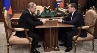 Dmitry Medvedev (pictured, right) claims that Russia may be forced to launch a full-scale ground war against NATO soon