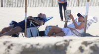 Biden hits the beach with Middle East, Congress in chaos