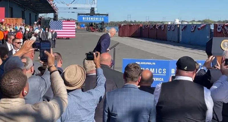 Biden trips in Philadelphia while climbing steps to podium on stage: video