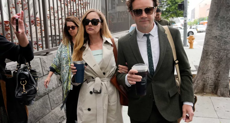 Bijou Phillips and Danny Masterson arriving to court.