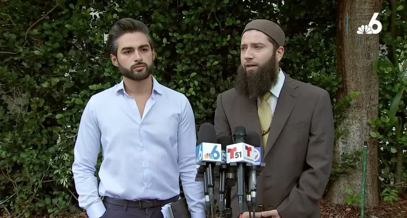 Dentist who was fired after tearing down hostage posters speaks out