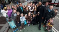 The Duggar family gathers together on the streets of New York for a photo in 2013. The entire Duggar family, save for a few kids, hit the beaches of Destin, Florida for a family vacation.