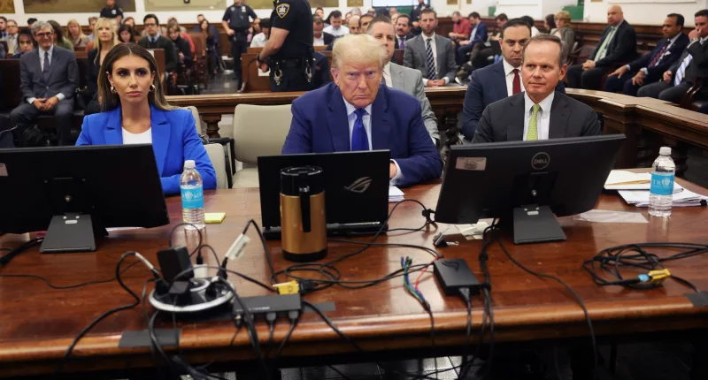 Donald Trump looked fuming as he was slapped with a $10,000 fine