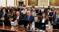 Former president Donald Trump (center) appeared in a New York courtroom on Monday for the first day of his trial
