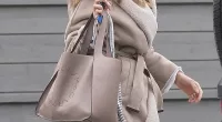 Rebecca Loos holding her car keys and a handbag as she walks out at her home in the village and ski resort of Hemsedal in Norway