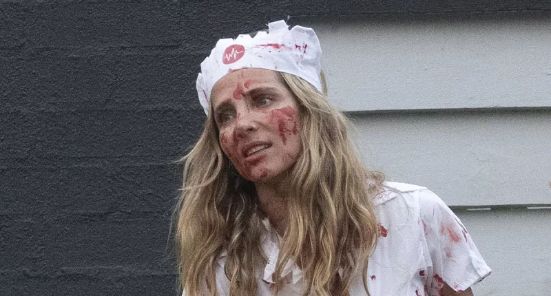 Elsa Pataky scares in a Halloween horror nurse costume in Byron Bay