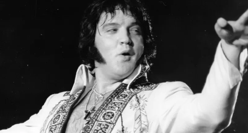 Elvis Presley performs in concert in 1977.