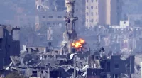As a missile strikes behind a minaret in Gaza, the Israeli Defence Forces has said it has eliminated two senior Hamas terror chiefs