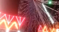 The giant Ferris wheel at the Navratri Mela festival in New Delhi suddenly stopped working