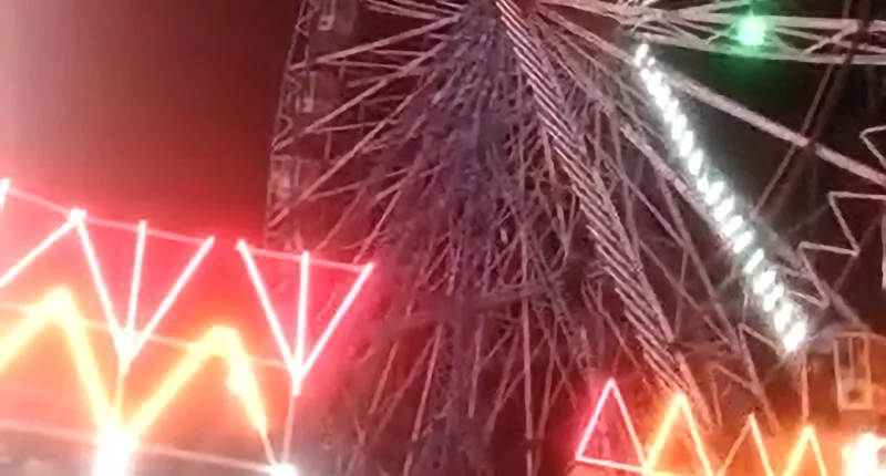 The giant Ferris wheel at the Navratri Mela festival in New Delhi suddenly stopped working