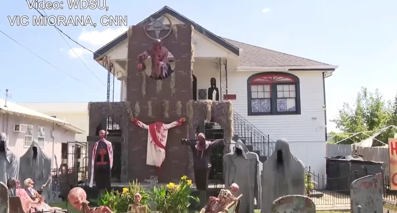 A Louisiana man has put temporarily split with his girlfriend to avoid taking down his elaborate Halloween decorations