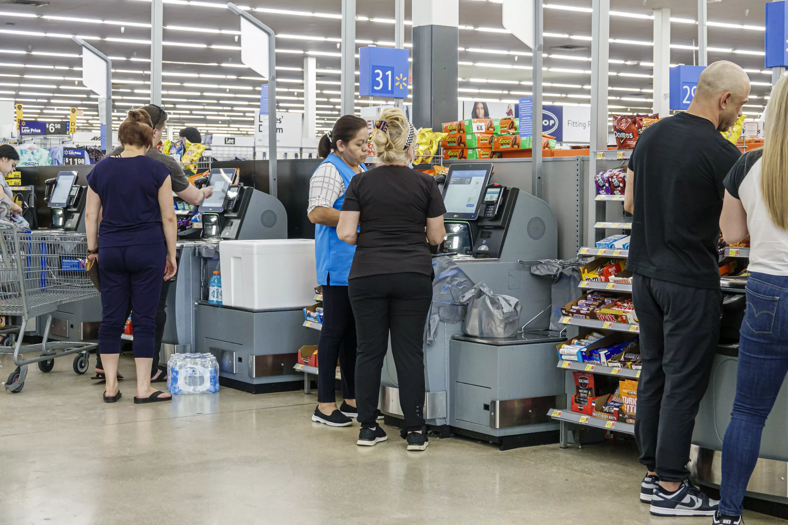 Walmart self-checkouts have been criticized by shoppers who complain that while using them they’re 'treated like criminals'