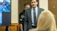 Bryan Kohberger smiles as he enters the courtroom for a hearing at the Latah County Courthouse in Moscow, Idaho