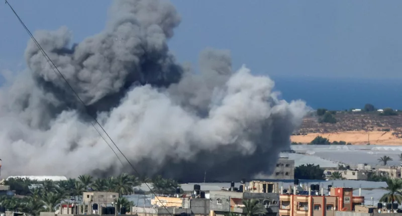 Smoke billows after an Israeli air strike in Rafah in the southern Gaza Strip