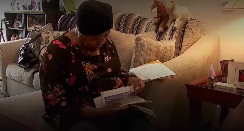 Senior citizen Mary Rainey fears losing her apartment over debts for a bill that she is exempt from paying