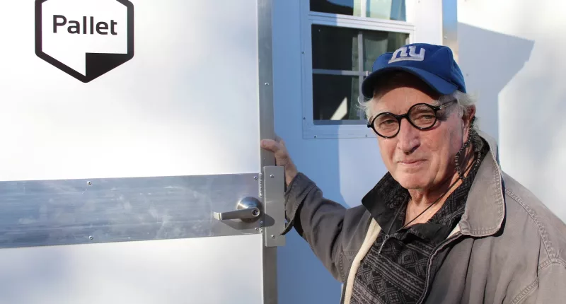 Mark Colville and his partner began helping the city's homeless people during the pandemic by welcoming them to set up camp in their backyard