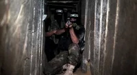 Armed fighters in one of the underground tunnels in Shujaya neighborhood of Gaza City