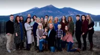 The Brown family is pictured together in a family portrait before the demise of their plural unions