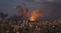 Smoke rises following an Israeli air strike in northern Gaza City
