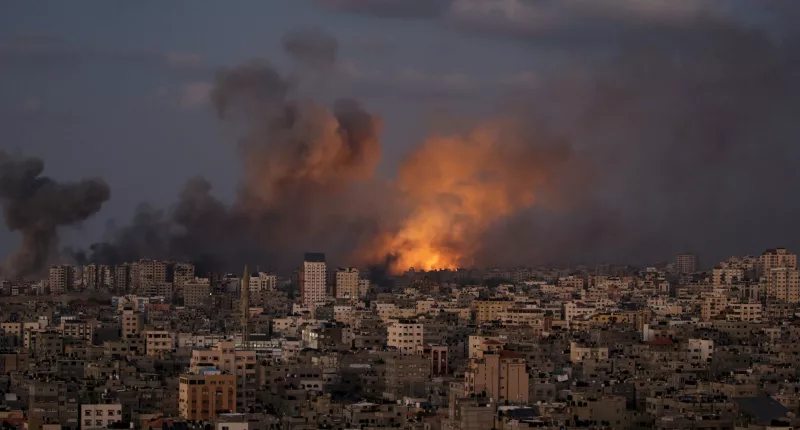 Smoke rises following an Israeli air strike in northern Gaza City
