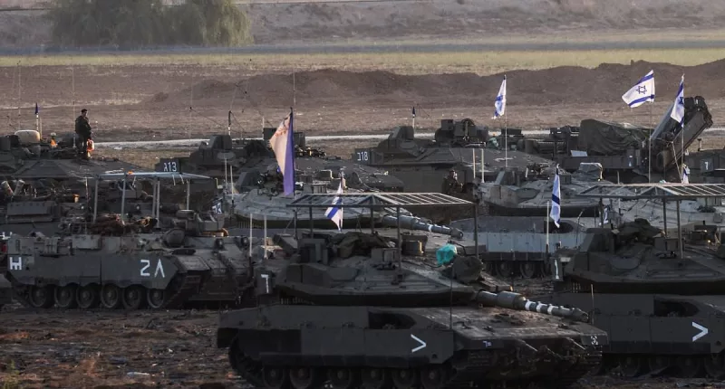Israel ramps up military activity along Gaza border as invasion looms