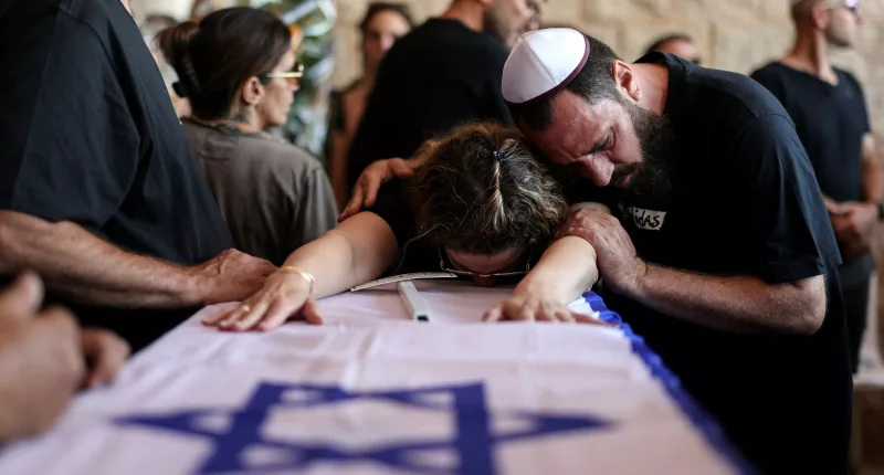 Israel faces the horrific task of identifying hundreds of mutilated and burnt bodies following the massacre by Hamas terrorists on October 7