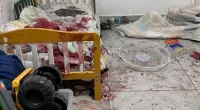 Israel's PM has shared a harrowing image of a child’s blood-drenched bed after Hamas ‘beheaded babies’ in their brutal massacre of Kfar Aza