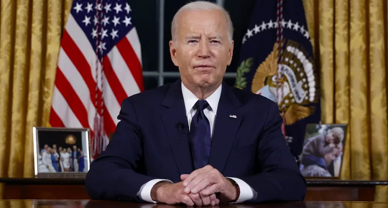 Joe Biden appears to read his teleprompter instructions in Oval speech