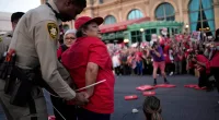 Las Vegas hotel workers arrested after disrupting traffic in labor dispute rally