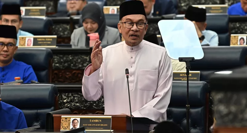 Malaysia to introduce new taxes, slash subsidies in economic reform push