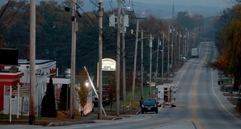 Manhunt for Maine shooter enters second day as divers search water
