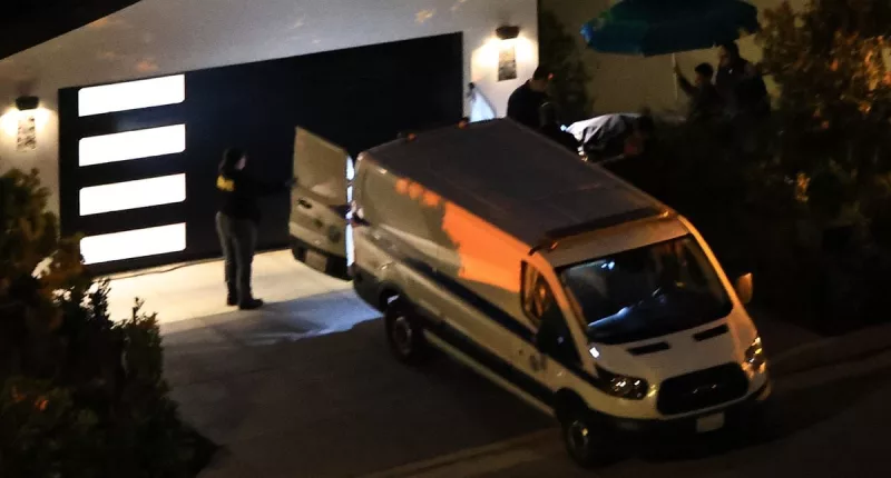 Matthew Perry's body is taken out of his home
